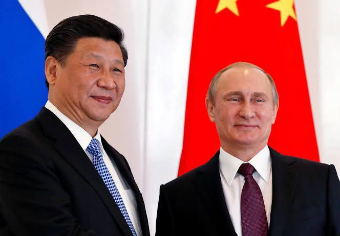 leancasar's tweet photo. La sonrisa de Putin en la reunión con Xi Jinping no era vista desde las reuniones con Cristina. https://t.co/PQwxQj1ok6