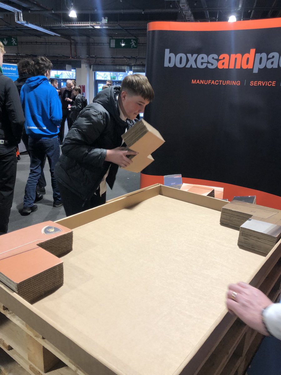 HHCareersDept's tweet photo. Pictured is Year 10 student Brad completing the Boxes &amp; Packaging sorting task last week at the OD Live careers event.. Brad was the overall winner and today he received his prize of a Vue Cinema gift voucher and other goodies from @boxes_packaging Well done Brad! @Hungerhill https://t.co/VVXPTMxdrX