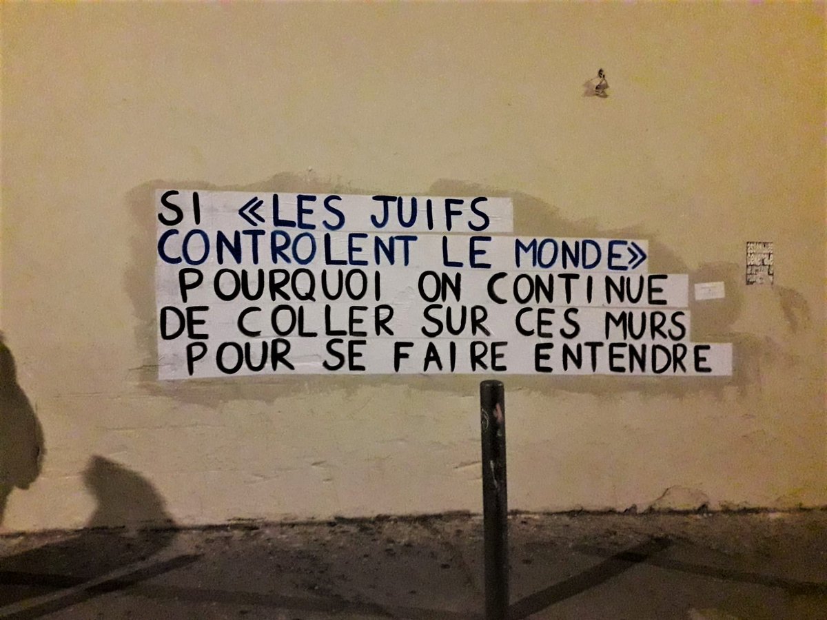 collages_ve's tweet photo. Franchement. Si nous contrôlions le monde, on passerait pas des heures à peindre des slogans et des nuits à les coller sur les murs pour dénoncer l'antisémitisme. 
On resterait tranquille chez nous à siroter des cocktails sur un canapé de liasses de billets. 
C'est pas le cas. 🤷 https://t.co/cXezHBVtTk