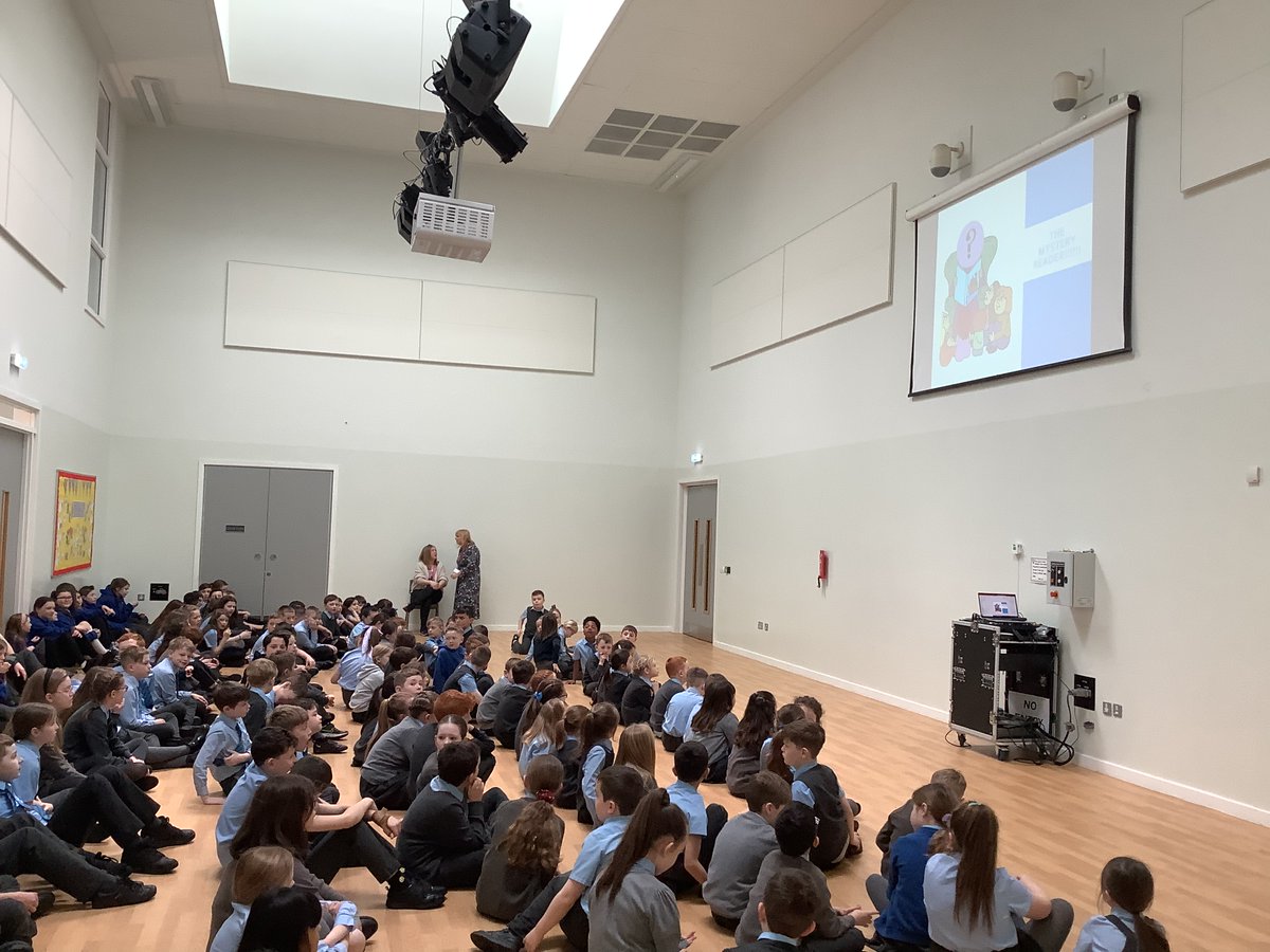 StJohnBoscoPS's tweet photo. At assembly the children had to guess who the mystery reader was⦠#readingschoolaward #superstarreader #courage https://t.co/lHyc8v75ay