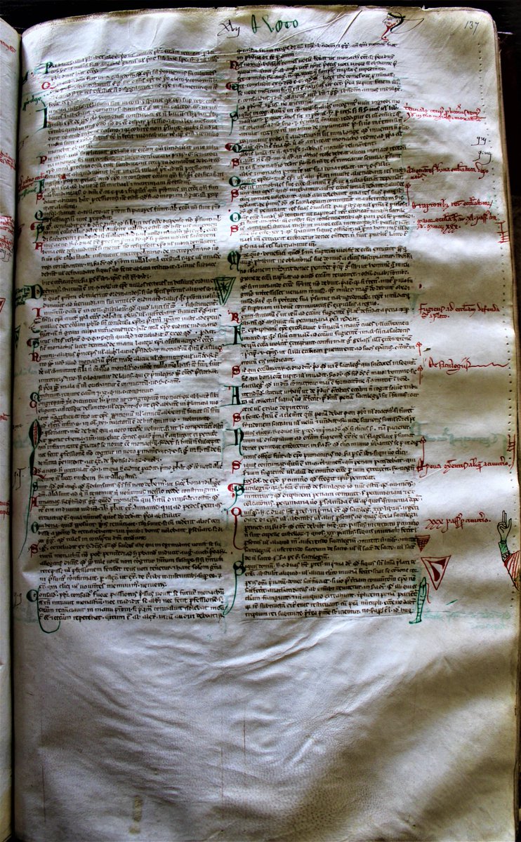 This 13th century law book includes Benecasa of Arezzo's 'Casus Decretorum'. If you look carefully you can see heraldic shields including one with a 'maunch' or the sleeve of a lady's costume, a fish, and a monk's face.  This manuscript was made in Italy (WCL F159 fol.130r)