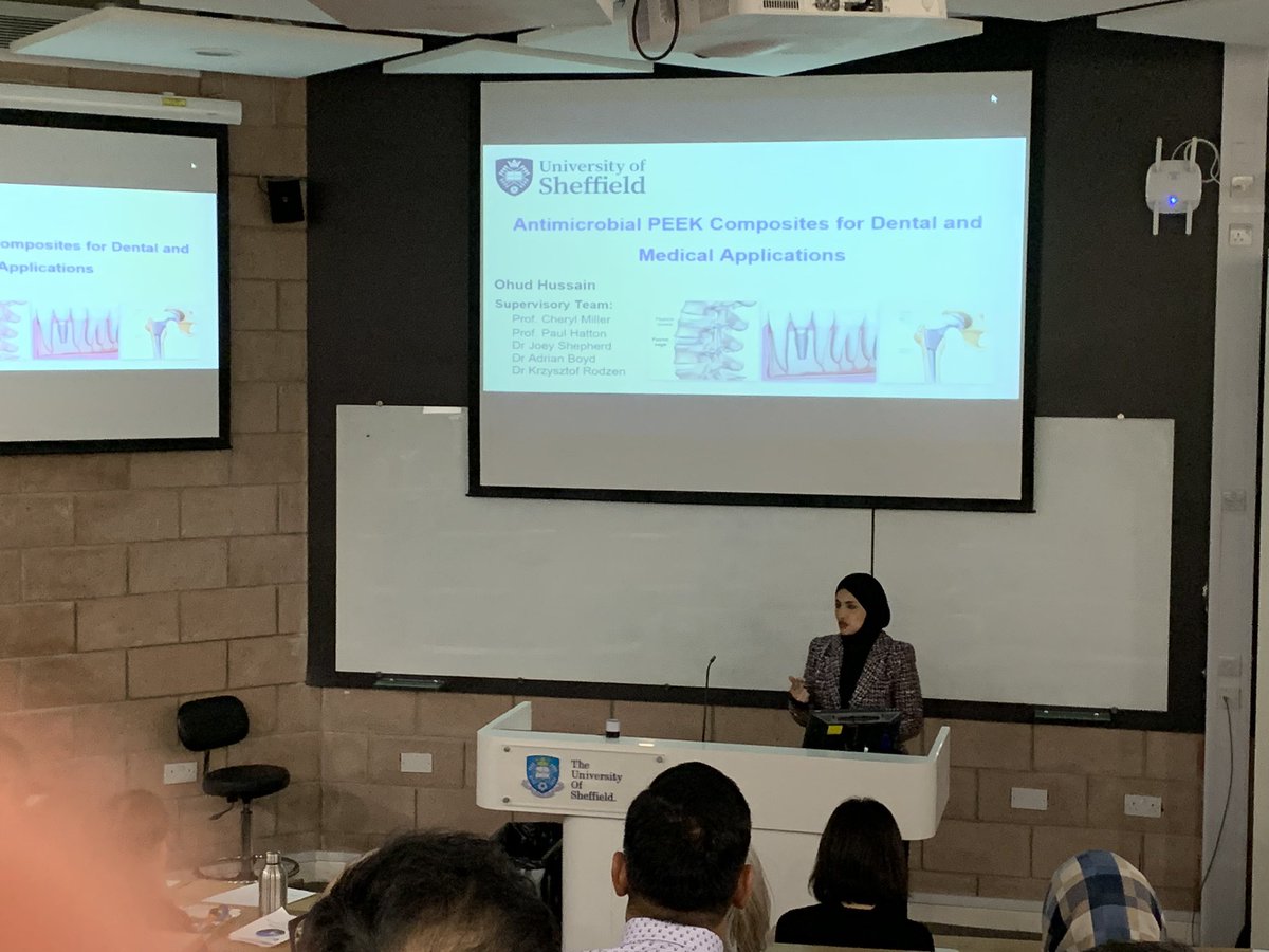 Prof_Hatton's tweet photo. Next PGR to speak is Ohud who is incorporating a novel #bioactiveglass to enhance PEEK in a project led by @Cheryl_A_Miller with @microshep and myself in Sheffield and the team of @boyd_ar at @UlsterUni Great turnout too, lecture theatre full of staff and students. https://t.co/awxYSJonu3