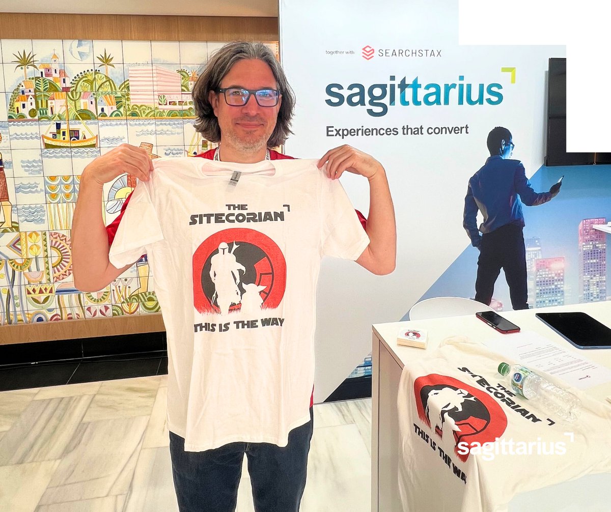 RemarkableXCP's tweet photo. Day one of #SUGCON is underway in Malaga, and we have SUGCON's Tamas Varga modelling our Sitecorian t-shirt! What do you think? 😁 #ThisIsTheWay #ExperiencesThatConvert https://t.co/BrTNufVft5