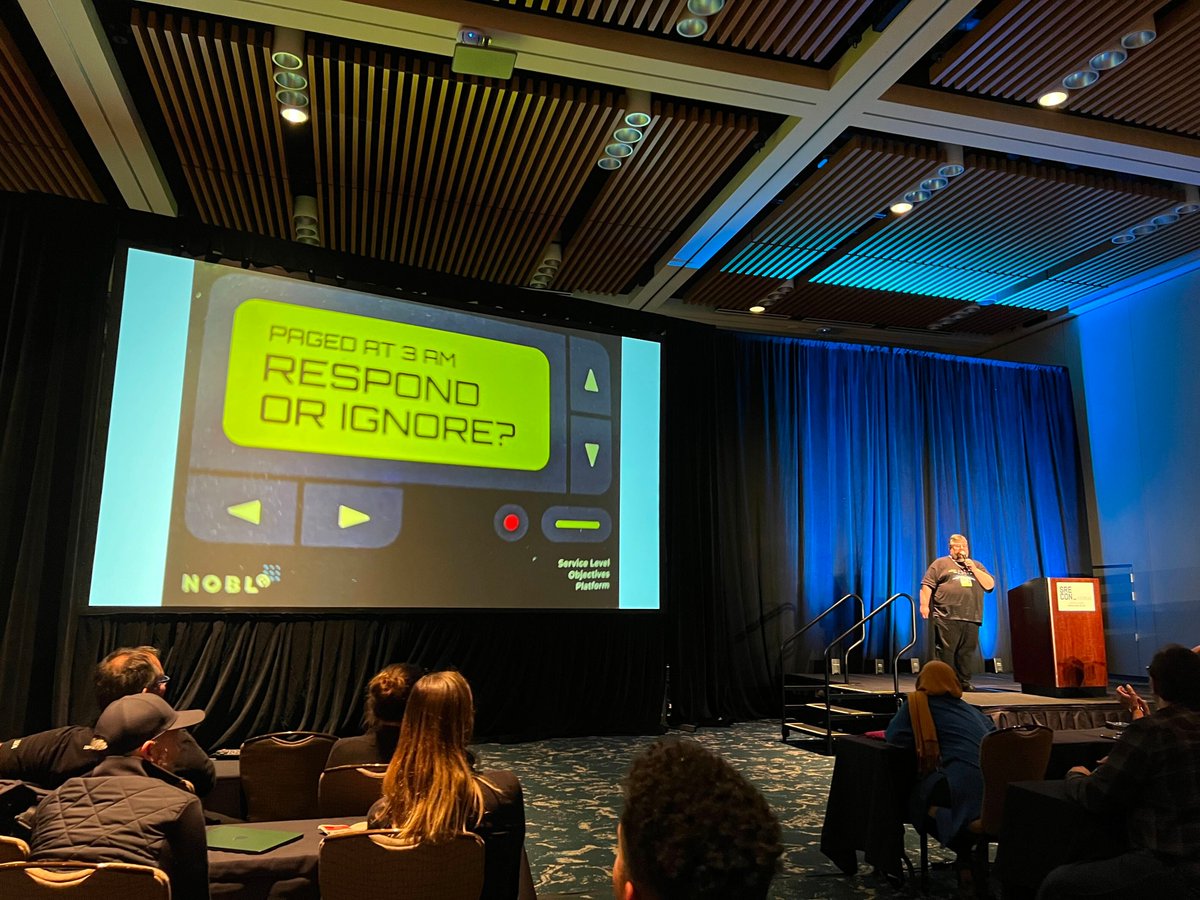 We ❤️seeing our card game being used during Lightning Talk Karaoke at #SREcon 2023!