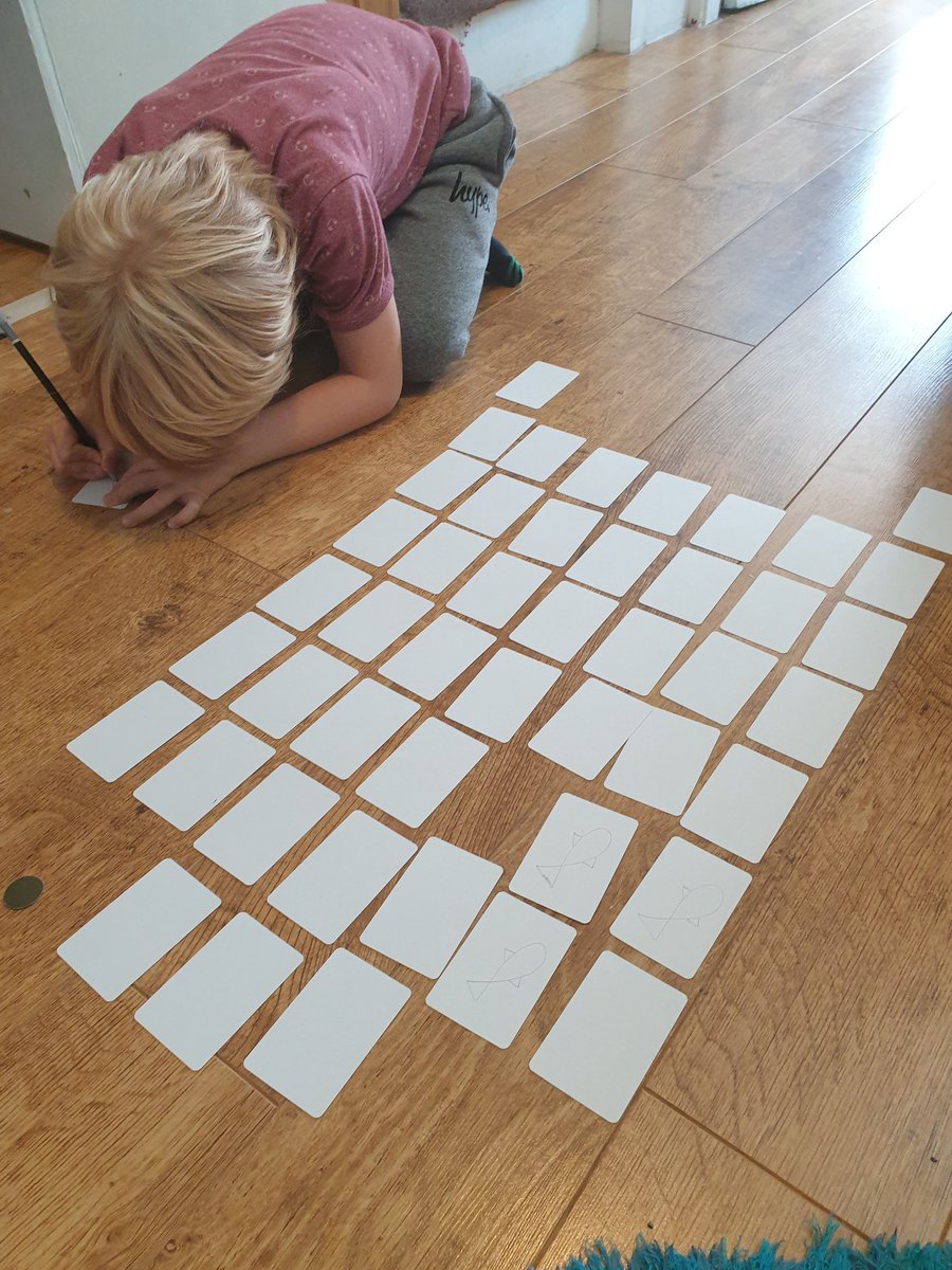 foulplaygamers's tweet image. Found another photo of the designer at work on Puffin Rush! (If you zoom in you can spot the fish!) 
This was a little bit later in the process as the hair is longer, and he's pinched some of our blank card stock to work with.