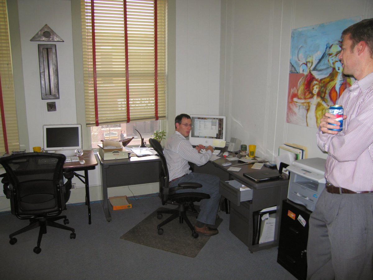 spinutech's tweet photo. Pictured here is a #ThrowbackThursday pic of Spinutech circa 2003. Marc and Eric are in the second official office of Spinutech that only consisted of five people. Much has changed since then, but the only thing that hasn’t changed is our company values🧡 

#LifeAtSpinutech https://t.co/UMdeN7x9Mt