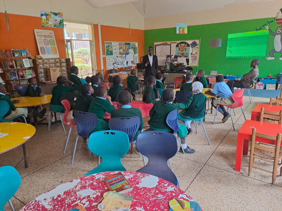 knlsmeru's tweet photo. Today C.C.M Primary School had a wonder session in the library later Hilton Mwenda and Isaiah Lameck took them through reading aloud stories from African storybook reader @knlsmedia #USDollar projected on the wall. https://t.co/Z6onhhyyHP