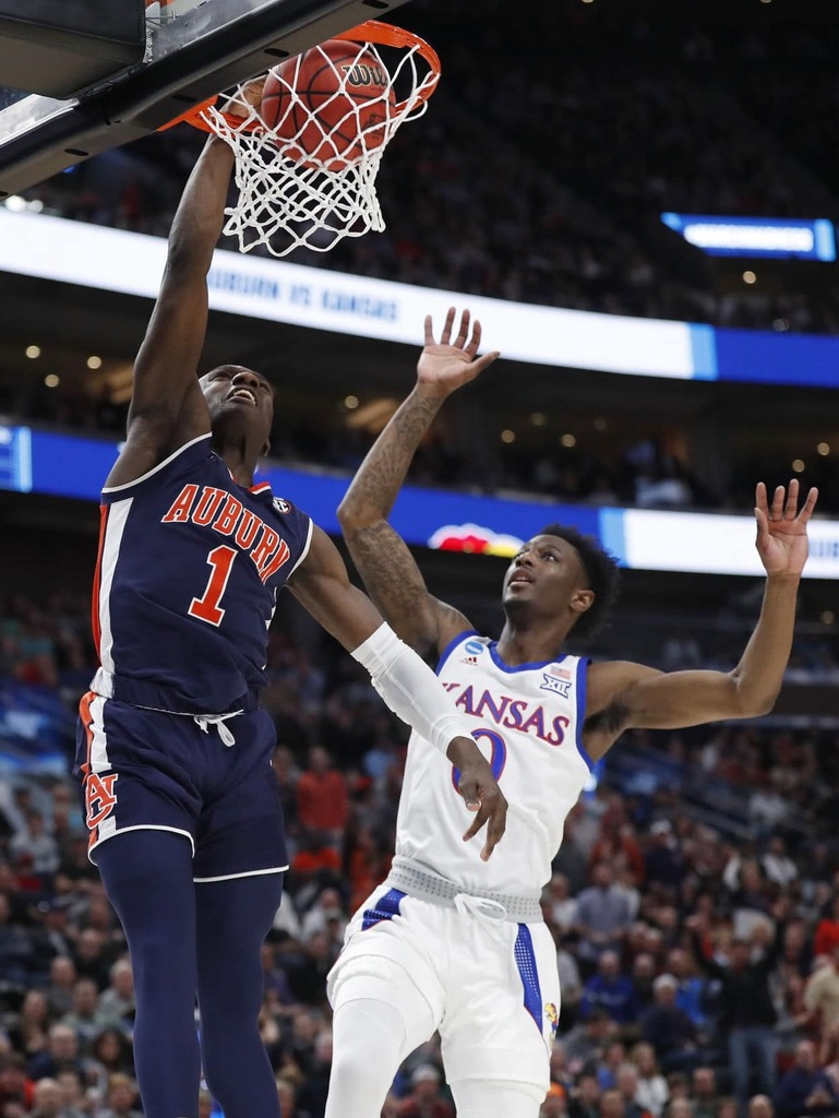 AUHistoryToday's tweet photo. 2019 - The Blue Blood Tour begins.

5-seed Auburn demolishes 4-seed Kansas 89-75 in the NCAA Tournament's second round.

All five starters scored, led by Bryce Brown's 25 points. Auburn shot 53% and drained 13 3-pointers.

#WarEagle #AUHistory https://t.co/Muy25oANl9