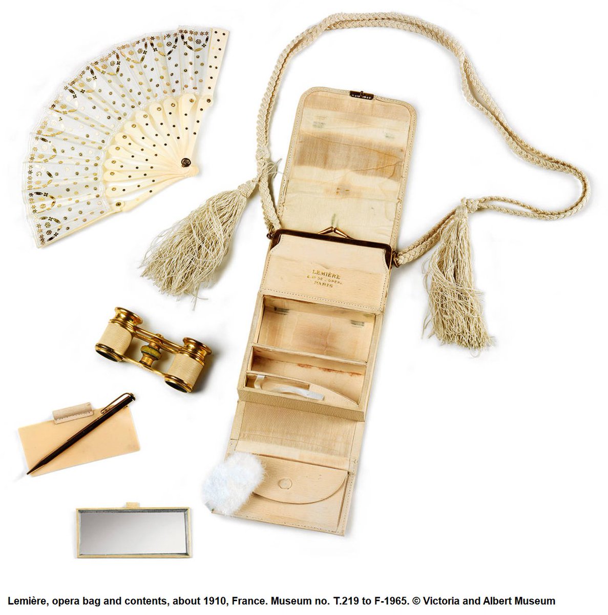 girls don't want diamonds, we want 1900s tiny opera handbags that fold open to reveal a fan, a notbook, a mirror and a pair of binoculars