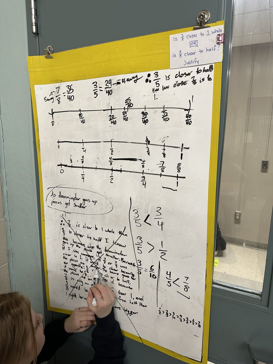 MsPenrice's tweet image. Proud of this young lady that dove into a centre head first and extracted every piece of learning she could. The question: Is 7/8 closer to 1 or is 3/5 closer to 1/2? #buildingthinkingclassrooms @PeterLiljedahl @GEDSB #verticalspaces