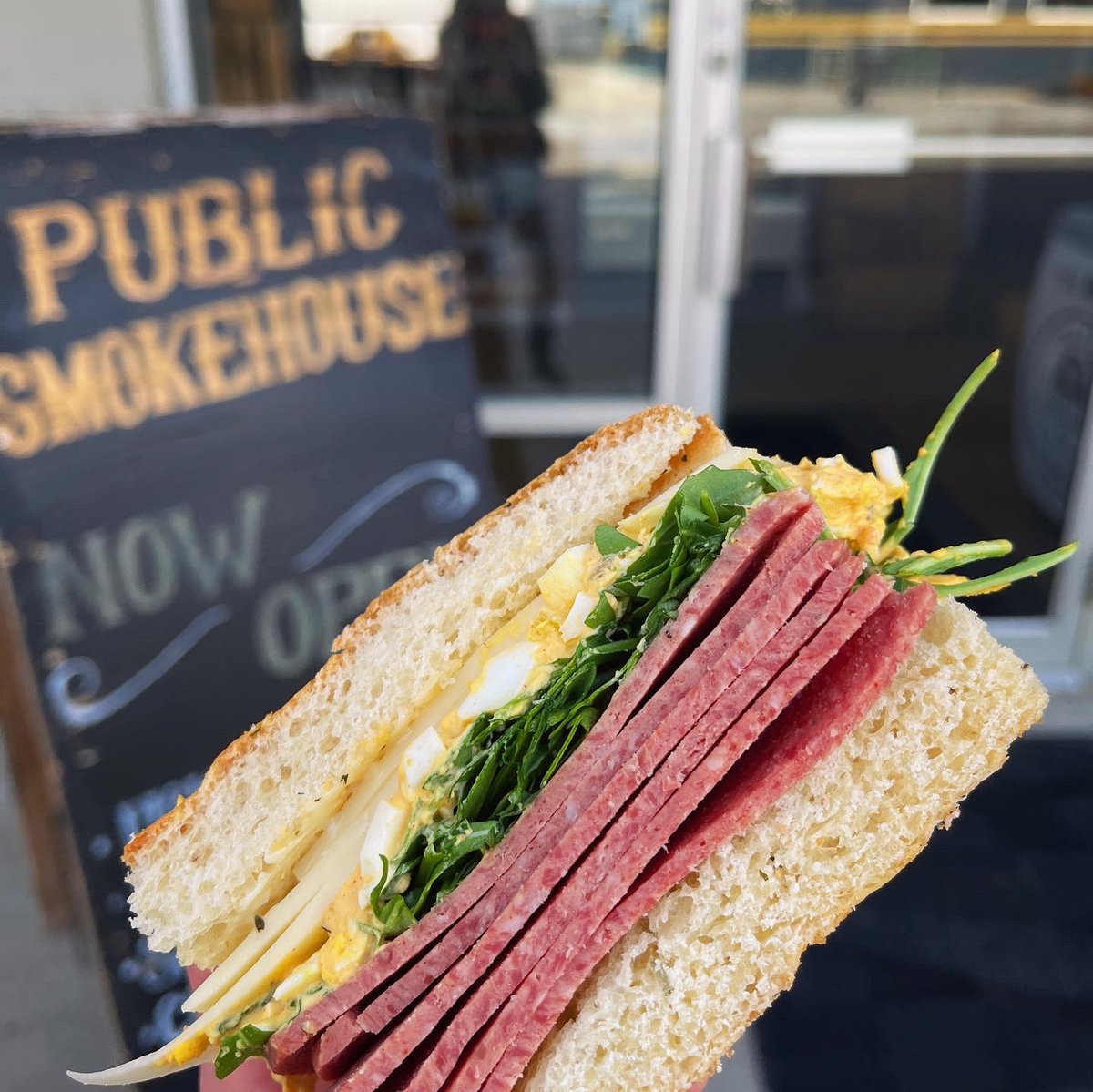 SmokingGoose's tweet photo. Our #PublicSmokehouse paired slices with curried egg salad, gruyere, and arugula on @breadworksbybridges focaccia for the #SandwichOfTheWeek - walk-in shopping and dine-in Mon-Fri 10am - 6pm and Sat 9am - 4pm 411 Dorman St #Indy free parking lot https://t.co/T1JxOTR8no