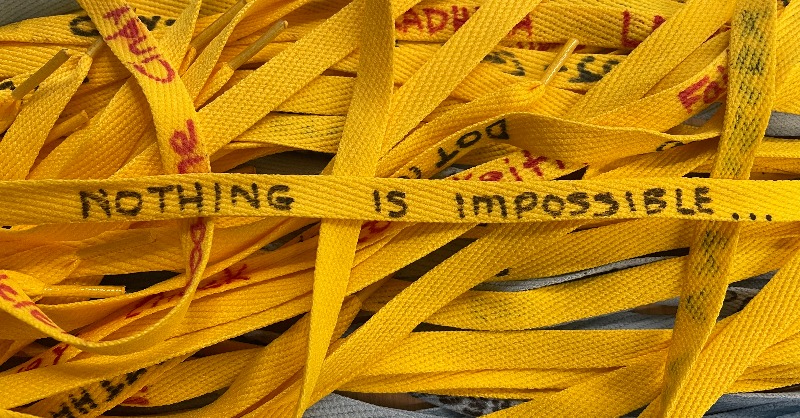 DaiichiSankyoUS's tweet photo. What might look like shoelaces and an ordinary wreath is actually a powerful symbol of our collective hope and united purposeâto serve patients with compassion. Find out why here: https://t.co/jynGzGojfi #InTheirShoes #DSProud