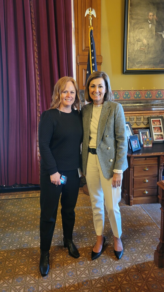 State Public Defender Jeff Wright and Project to Preserve Families Administrator Nicole Mundy attended the signing of Iowa House File 113 into law.