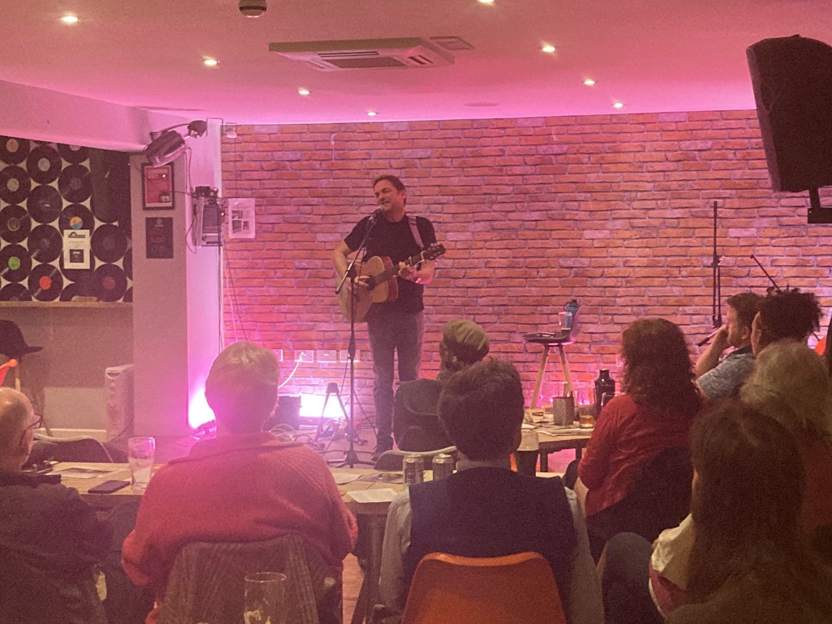GregMulholland1's tweet photo. At the famous @TopicFolk #TopicFolkClub #Bradford, the world’s oldest operating #folkclub at @PadShipley #GroovePad enjoying the excellent @ChrisRonMusic, last night of his UK tour. Chris is from Derbyshire but lives in Canada. Love the blend of folk, Americana & Neil Young! 🎶🎵 https://t.co/aLOdyNNYGa