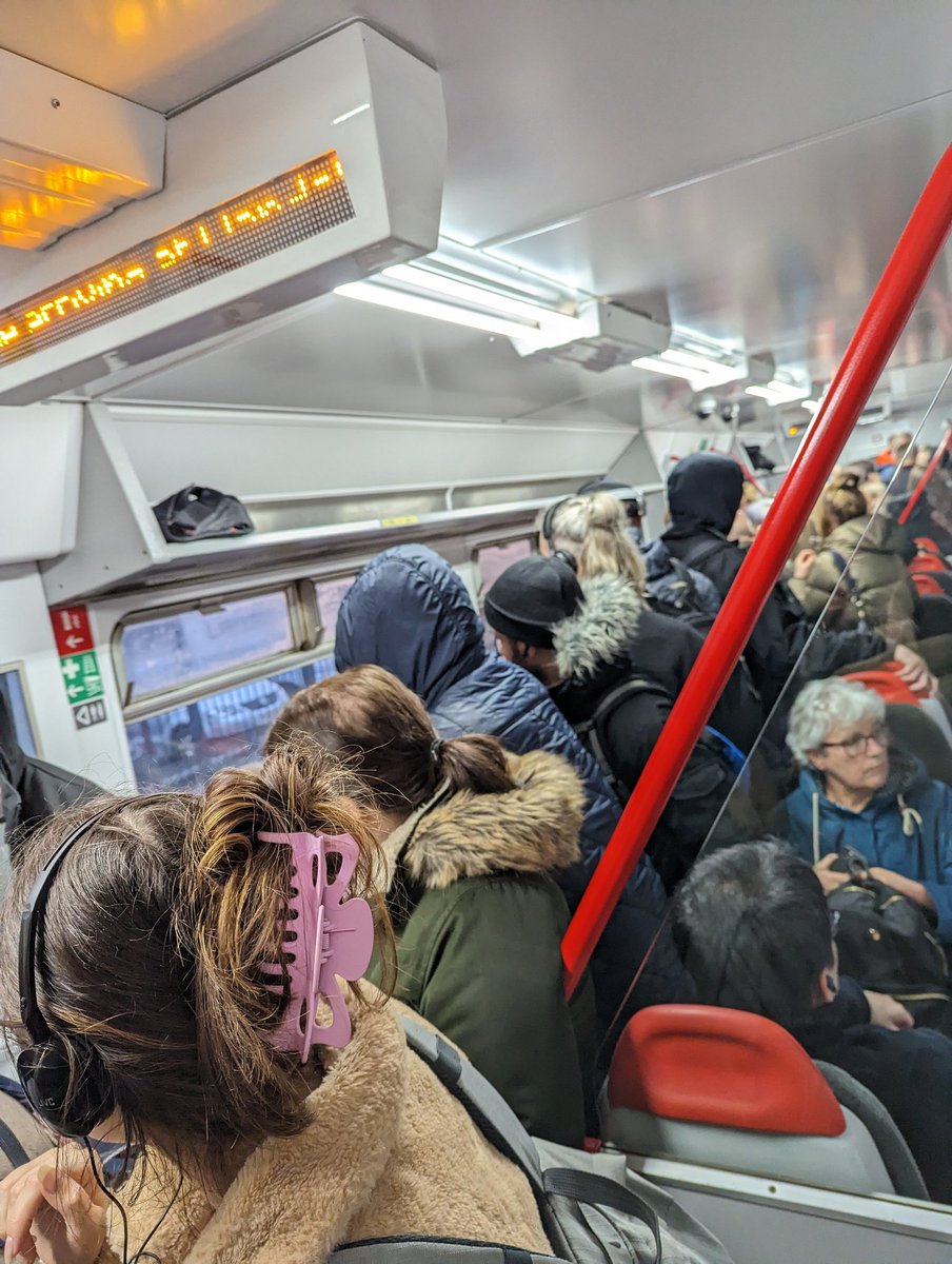 Rhysmorg1998's tweet photo. @tfwrail following recent prices increases on the Welsh Valley lines, is this what we are paying for? Vastly overcrowded, (bordering unsafe) travel on the commute home? Cancellations of peak time trains leaveing people literally squashed against doors and lining the aisles https://t.co/pxy1TShNEZ