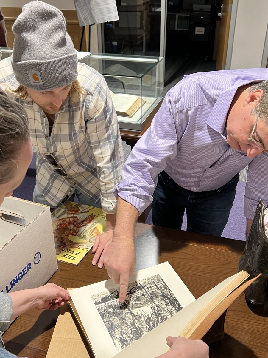 TCULibrary's tweet photo. Never know what (or who) you'll find digging through @tculibrary archives. You know him from 1883, actor Eric Nelson and producer Johnathan Brownlee research items for The Will Rogers Project. 
#TCU #TCUSpecialCollections https://t.co/0Mf3GDp14w