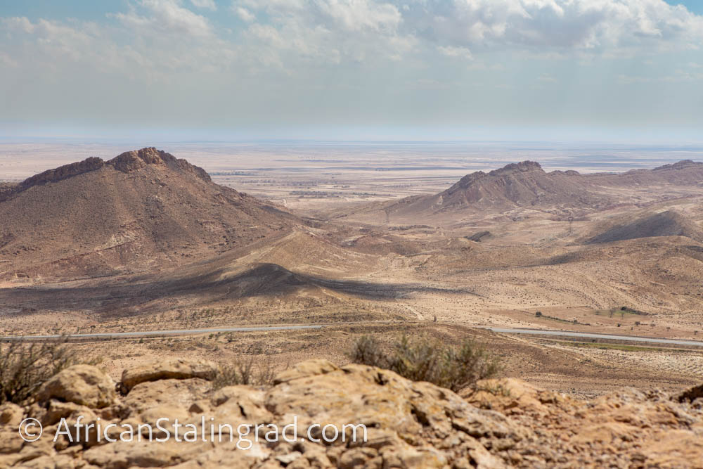 Mountain Pass that David Stirling's patrol passed in 1943, seen today. View from Point 275, highest point in battle of Wadi Akarit. Behind where I am standing is where his Patrol were captured. Thanks @PhoneyMajor for info. #Tunisia80 #TunisianBattlefieldsToday #SASrogueheroes