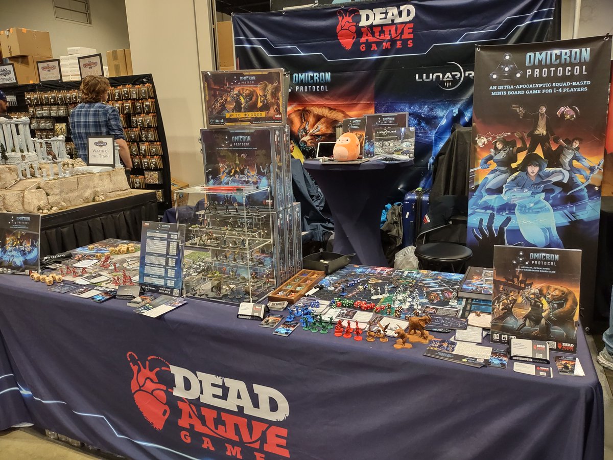 deadalivegames's tweet photo. Yay the backdrop showed up! Now our booth is complete! #adepticon2023 #omicronprotocol #deadalivegames https://t.co/PzpumKVTwb