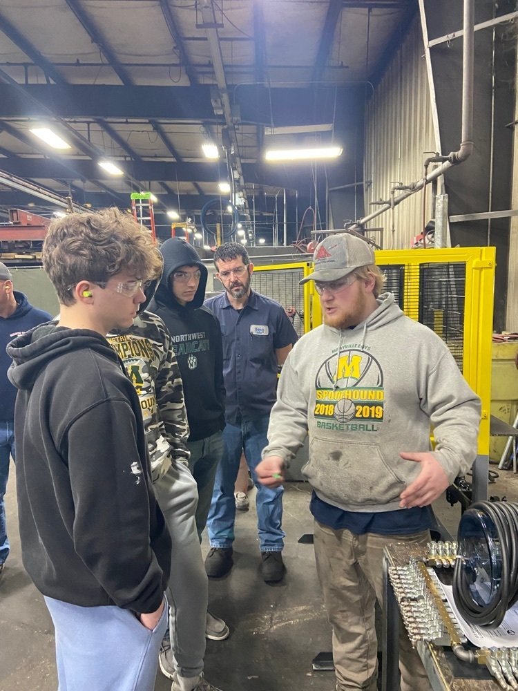 NWTechSchool's tweet photo. Craigin Wilson, a senior Maryville High School/NTS student, participates in a Laclede Chain paid apprenticeship program. Craigin explains to NTS students what he does at Laclede Chain. https://t.co/oWSQYTmiuH