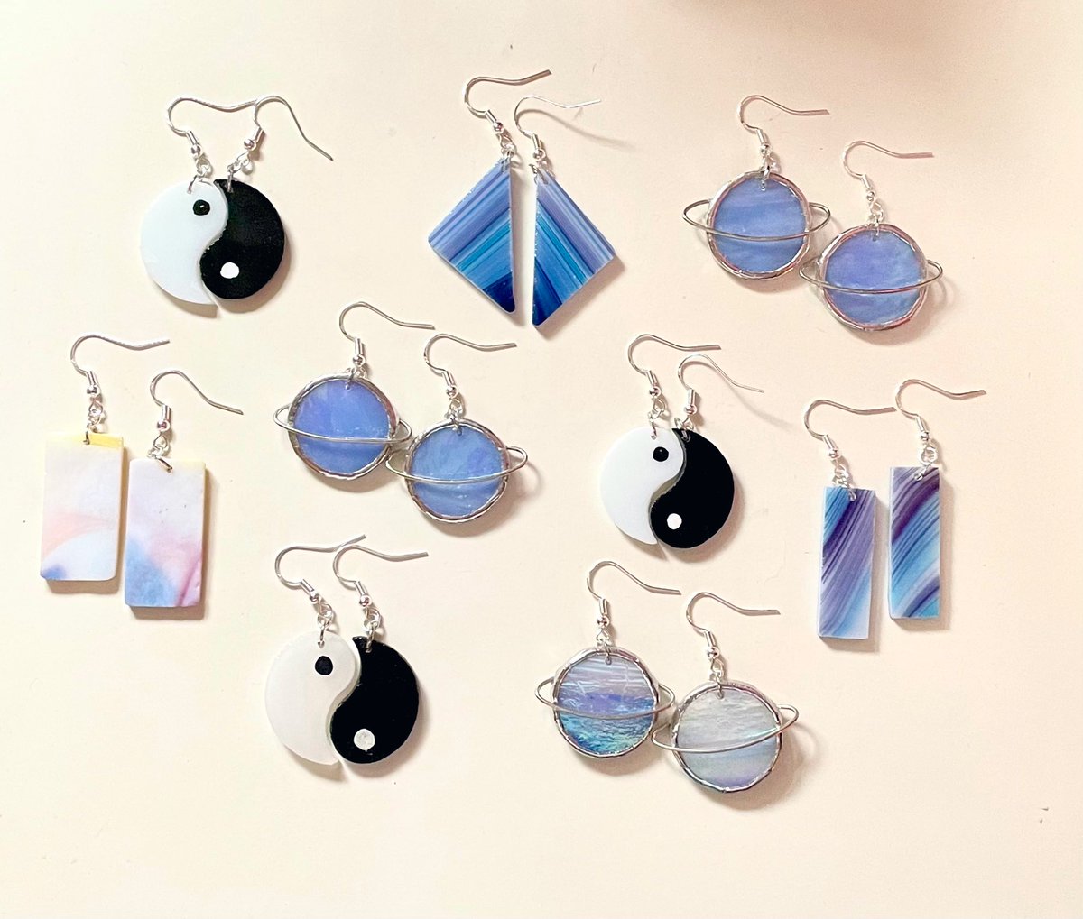whitewavewitch's tweet photo. Stained glass earrings and more available now 💫 moon customs are also open <3 https://t.co/lzpudjqNYX