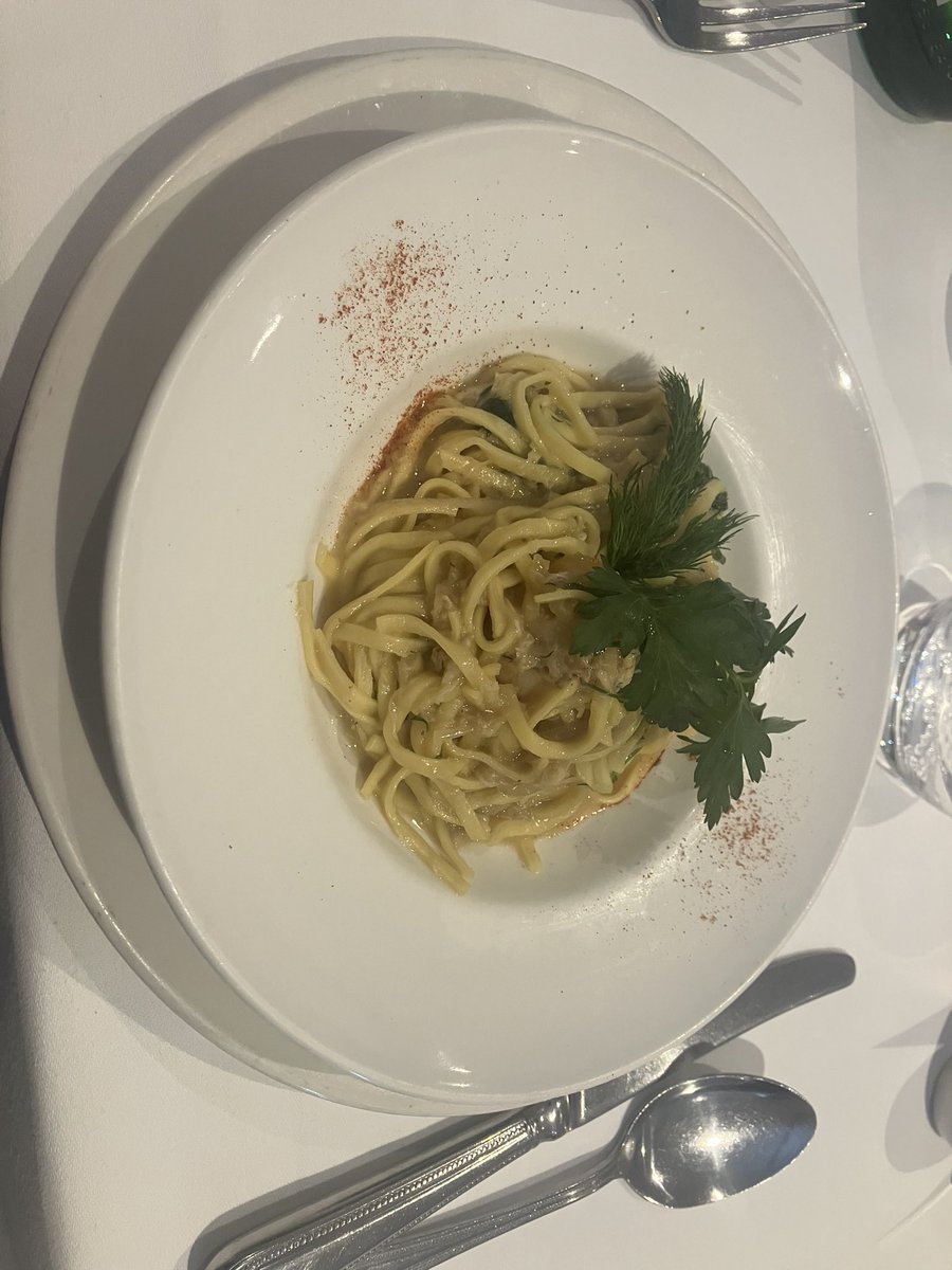 Tagliolini with scallops and crabmeat.