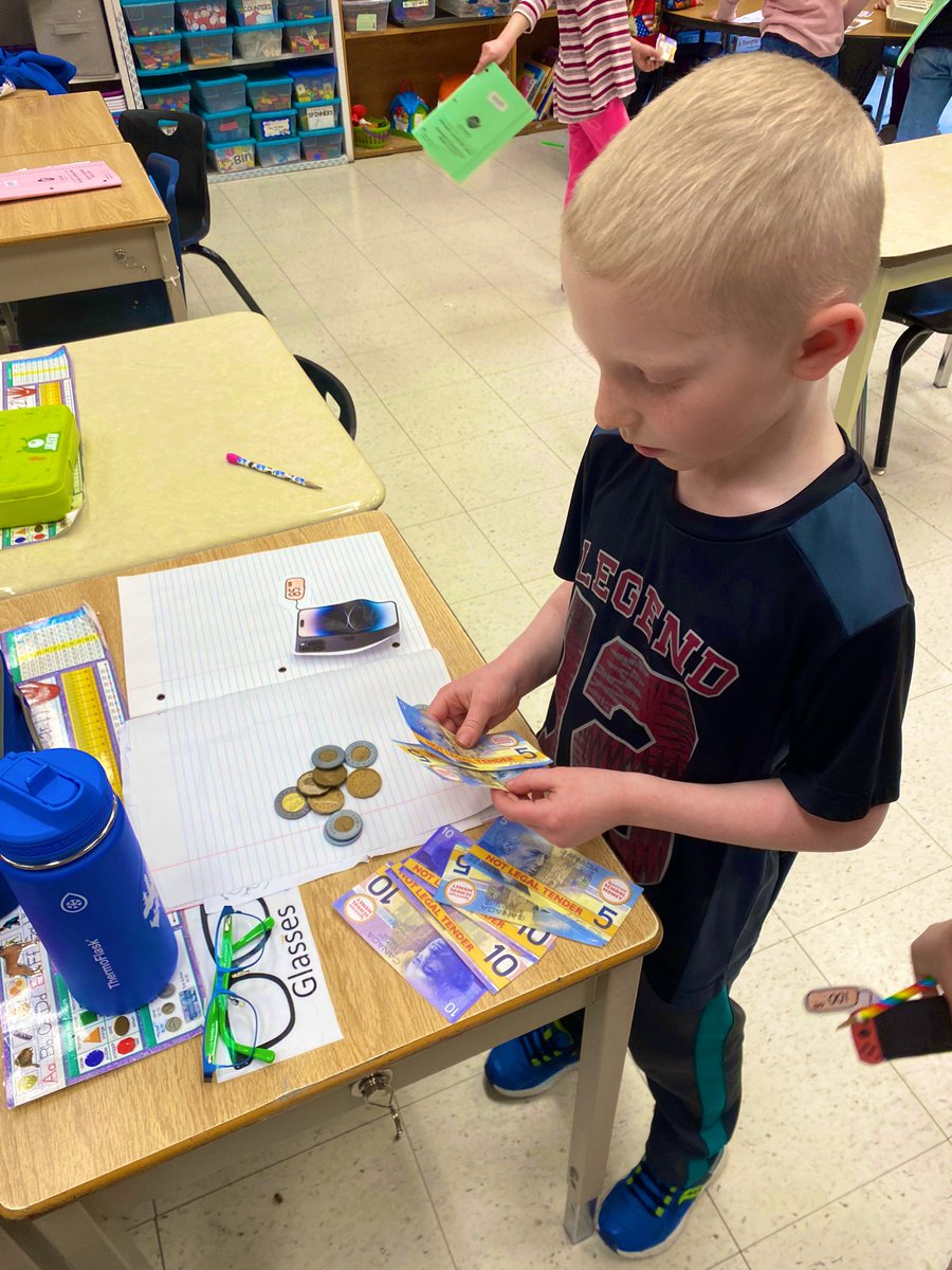 MsPenny14's tweet photo. Today we had lots of fun practicing what we’ve been learning about Canadian money. Students got to choose items around the room and paid at our cashier station to receive their change💰 Students bought puppies, Pokémon cards, and even a trip to DisneyLand✨ https://t.co/edpj3AvKHB