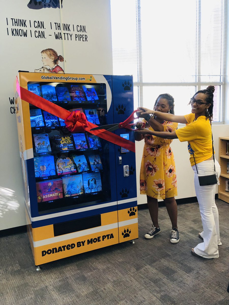nikkoleflowers1's tweet photo. Ribbon Cutting Ceremony for our book vending machine! Thank you parents and PTA for this generous donation! @FultonCoSchools @FultonZone7 @pbwright17 @MOE_tigersart @MoePta #WeAreMOE https://t.co/1r3w8rhn9A