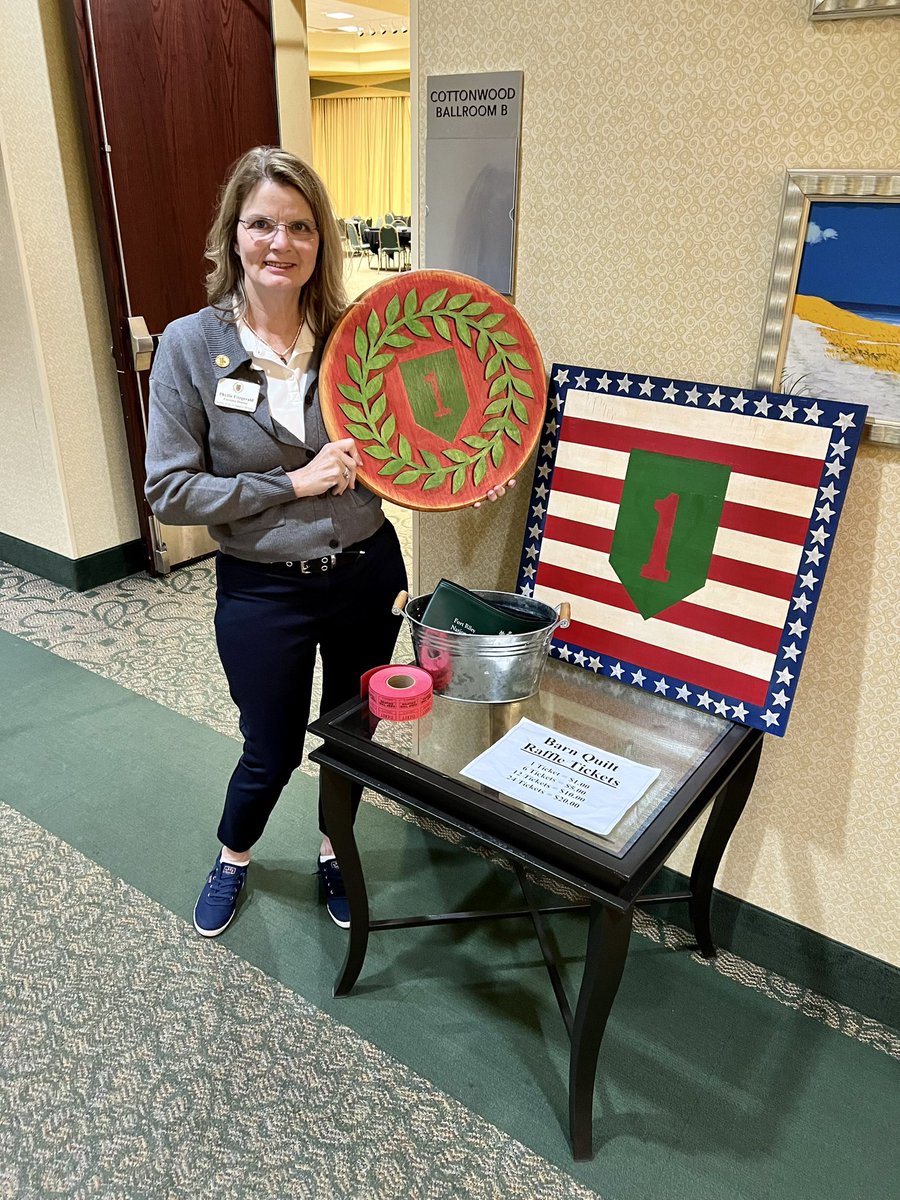 Todays winner of the Big Red One wood barn quilt block that I design, paint &amp; donate monthly hung it in the Dickinson County commission chamber in Abilene KS. All proceeds from raffle go to JCHS graduating seniors that are military dependents. Can you see the ❤️on the one?