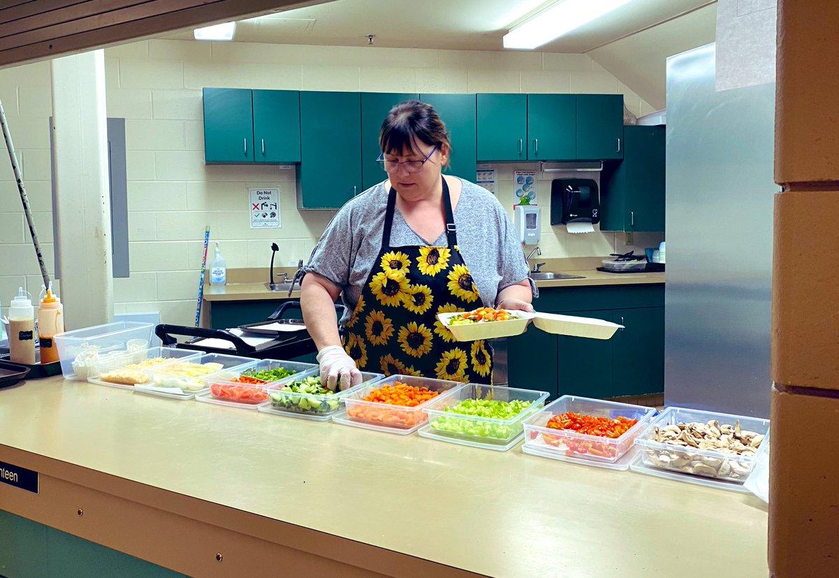 Mrs Connors and our new salad bar! My 7&10yr olds and I give it 👍👍👍Thank you for your hard work, Mrs C! @weschoolns