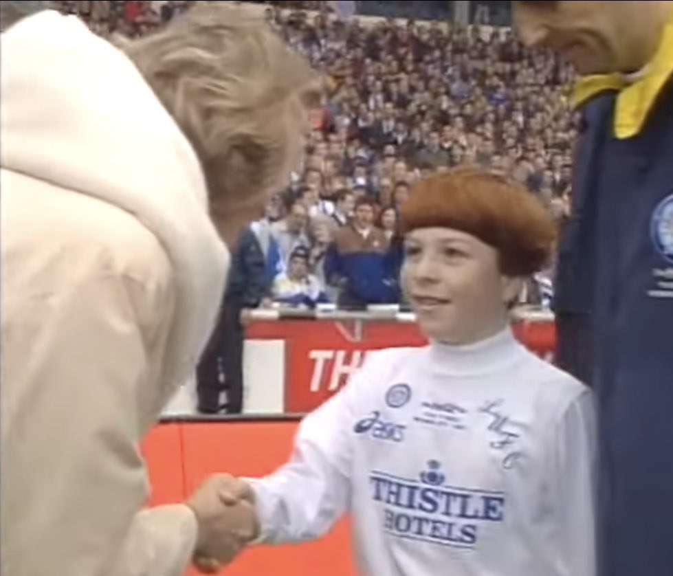stusfootyflash's tweet photo. It’s the 27th anniversary of the Coca-Cola Cup final between Aston Villa and Leeds Utd.

But more importantly, it’s that time of year again where we salute this young lad (@LUFCBayArea) for sporting the single greatest haircut ever seen on a mascot.

Epic. Absolutely epic. 👏🏻 https://t.co/LEmMkTgvCT