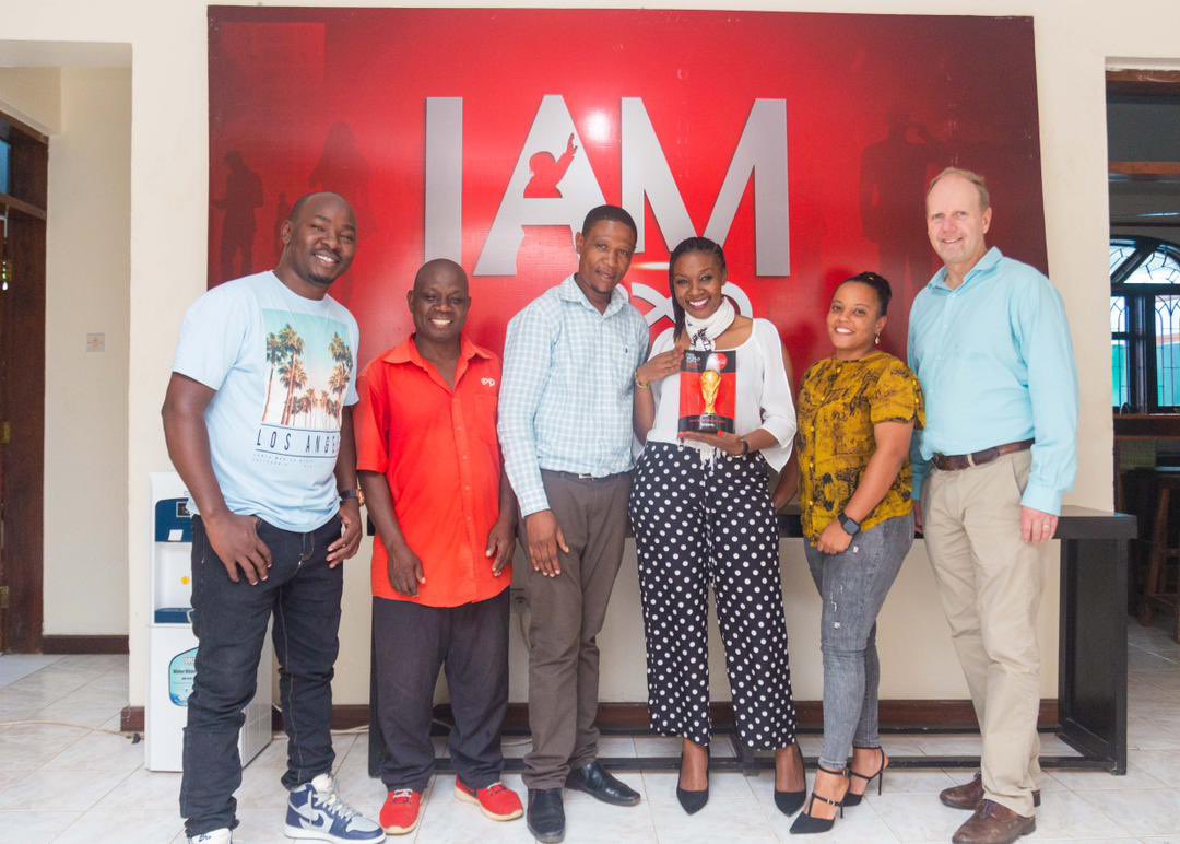 kenyaexp's tweet photo. A proud Exp Tanzania with the award that our client - Coca-Cola Tanzania - won for being the most agile market (across 51 countries &amp; territories) for last years FIFA World Cup Trophy Tour, by Coca-Cola. Coca-Cola Kenya was 2nd in the same category, proudly managed by Exp Kenya. https://t.co/BgUVqvH53d