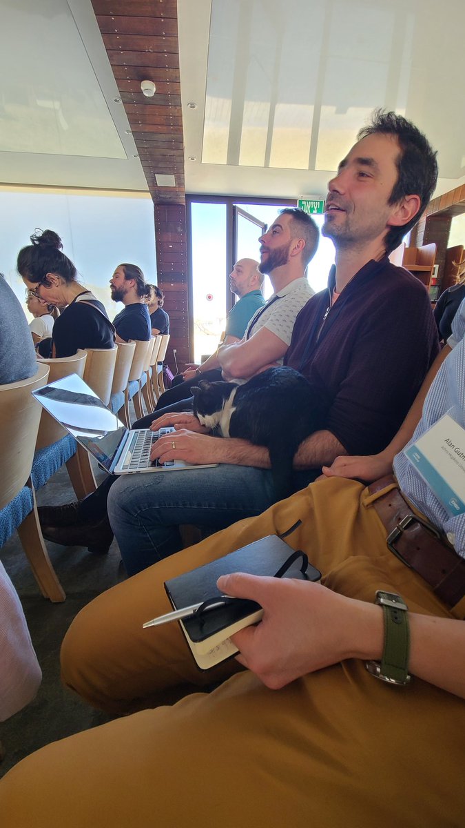 drosophilosophy's tweet photo. yeah, your meeting is cool, but is it cats sitting on your lap during the talks cool? because #emboneuronalremodelling23 is ... https://t.co/9XIaMM5g9T