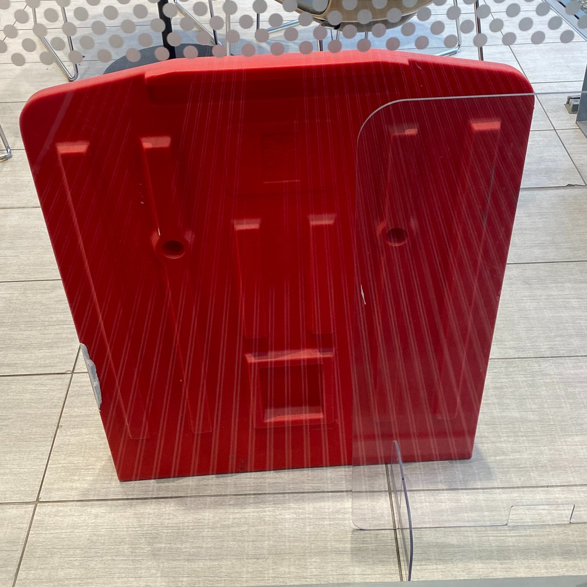 The back of the fire extinguisher stand looks surprised to see me