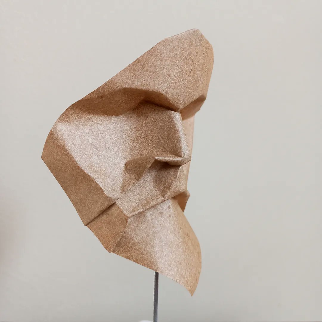 MattBookbinding's tweet photo. Quick Head Study. Designed and folded by me from 10x10cm elephant hide paper. #origami #origamihead #origamimask #origamisculpture #elephanthidepaper https://t.co/KgSZcJVoSF