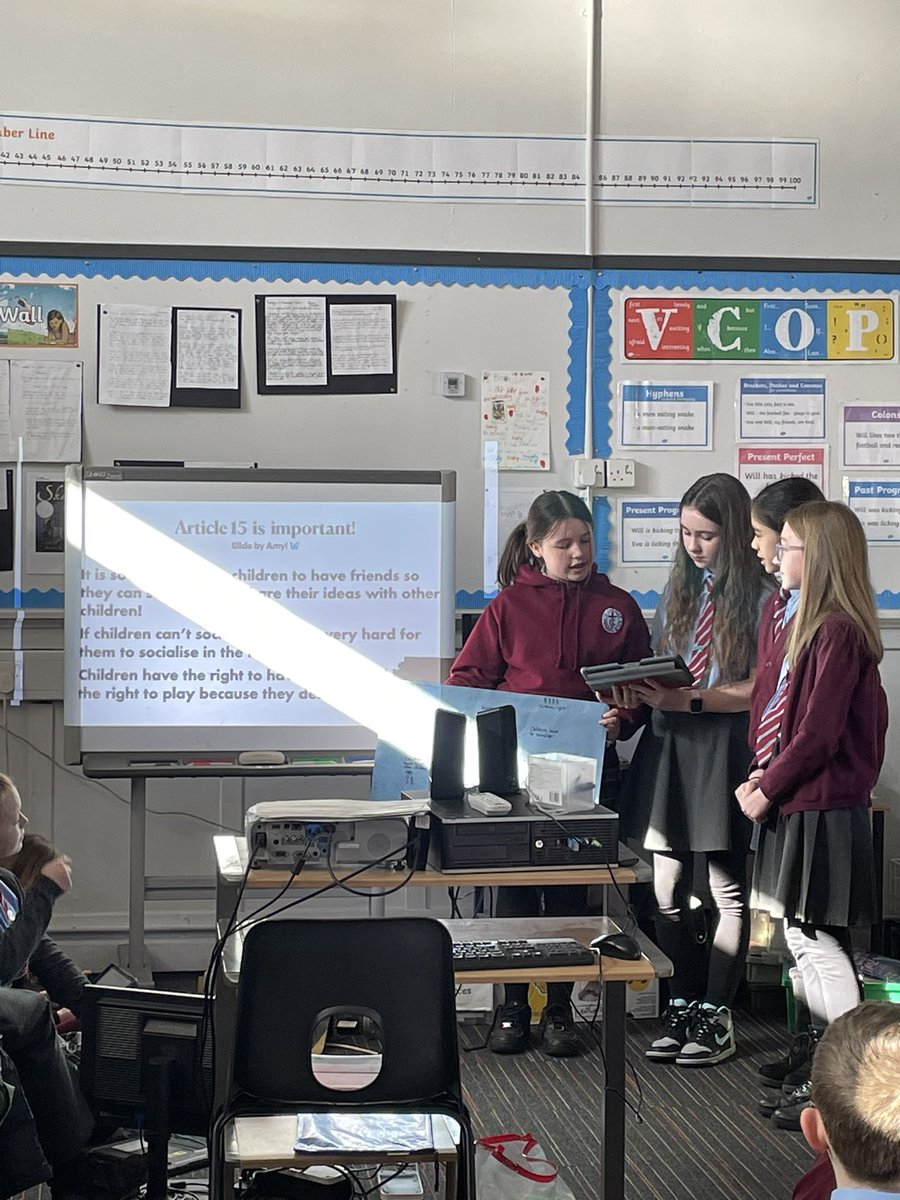 StCharlesGla's tweet photo. At the end of our #RightsRespectingWeek each class shared their learning with another class. P6 had been focusing on #Article13 - the right to freedom of expression and P7 had been focusing on #Article15 - the right to meet up with other children #RightsRespectingStCharles https://t.co/PsAQ0epFjj