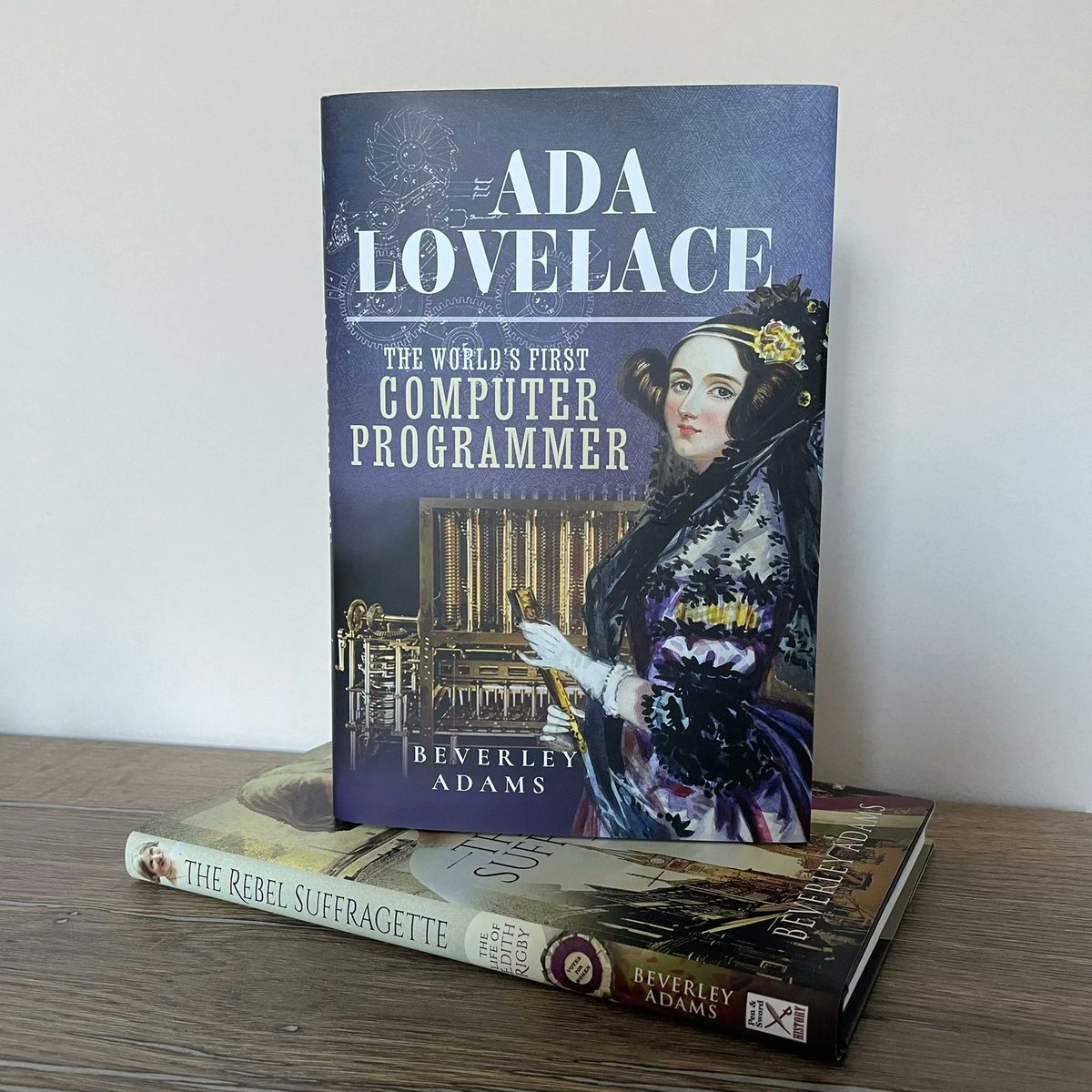 PSHistory's tweet photo. #MiniStack 📚 We think that @WriterBeverleyA's latest release, Ada Lovelace – The World’s First Computer Programmer, looks gorgeous with her previous book, The Rebel Suffragette – The Life of Edith Rigby 💜🤍💚 https://t.co/5RA5bkzsOC