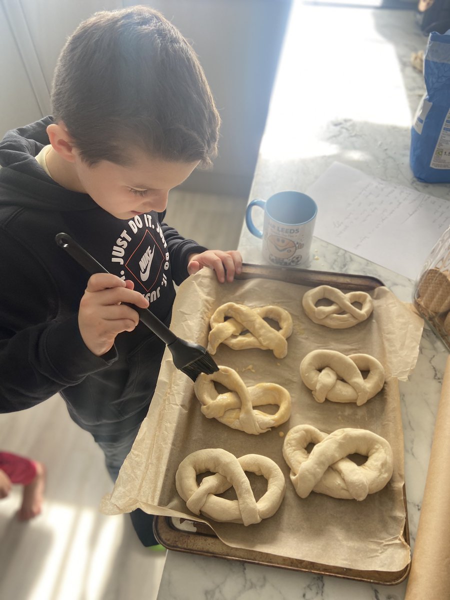 belcher_miss's tweet photo. Charlie making his Lenten pretzels for his homework, remembering we have our arms crossed in prayer throughout Lent ✝️ @WinefrideS @bcw_cat https://t.co/JyviQIcSwo