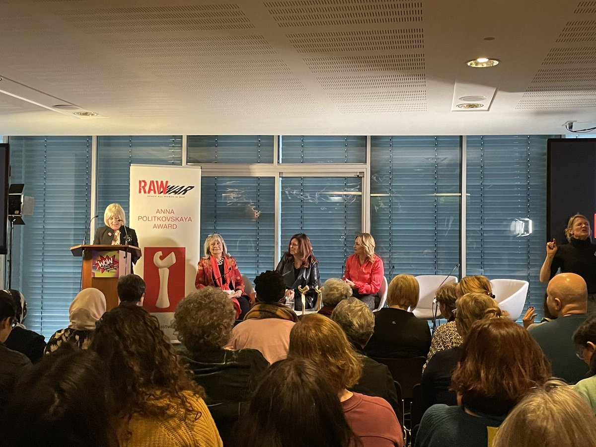 This year marks the 10th anniversary of RAW in War (Reach all Women in War) at #WOWLDN. Presenting the Anna Politkovskaya Award this year is @HelenaKennedyQC, @RawinWar Founder @KatzarovaM & Elena Kudimova, Anna Politkovskaya's sister.