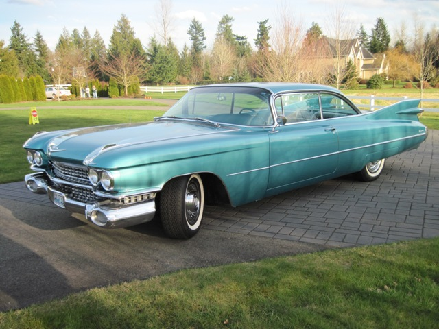 I've been fortunate to realise owing my dream car below. What is your dream car?