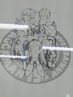 Draft version of Ryuji Higurashi's Rockman 15th Anniversary key art. This early piece was briefly on display at the 15th anniversary mall tour throughout Japan in 2002. A higher resolution remains unavailable. 