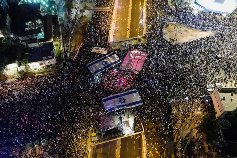 AlonyHamed's tweet photo. Is #Netanyahu becoming a dictator? 
We discuss the latest protests in #Israel and more with @levy_haaretz @sally_abed &amp; @Gil_Hoffman 
Join @afinighan at 17:30GMT on @AJInsideStory produced by @diarmaidfleming @PhuongyN and @AlonyHamed 
[📸Reuters] https://t.co/zzwAkQsZUD