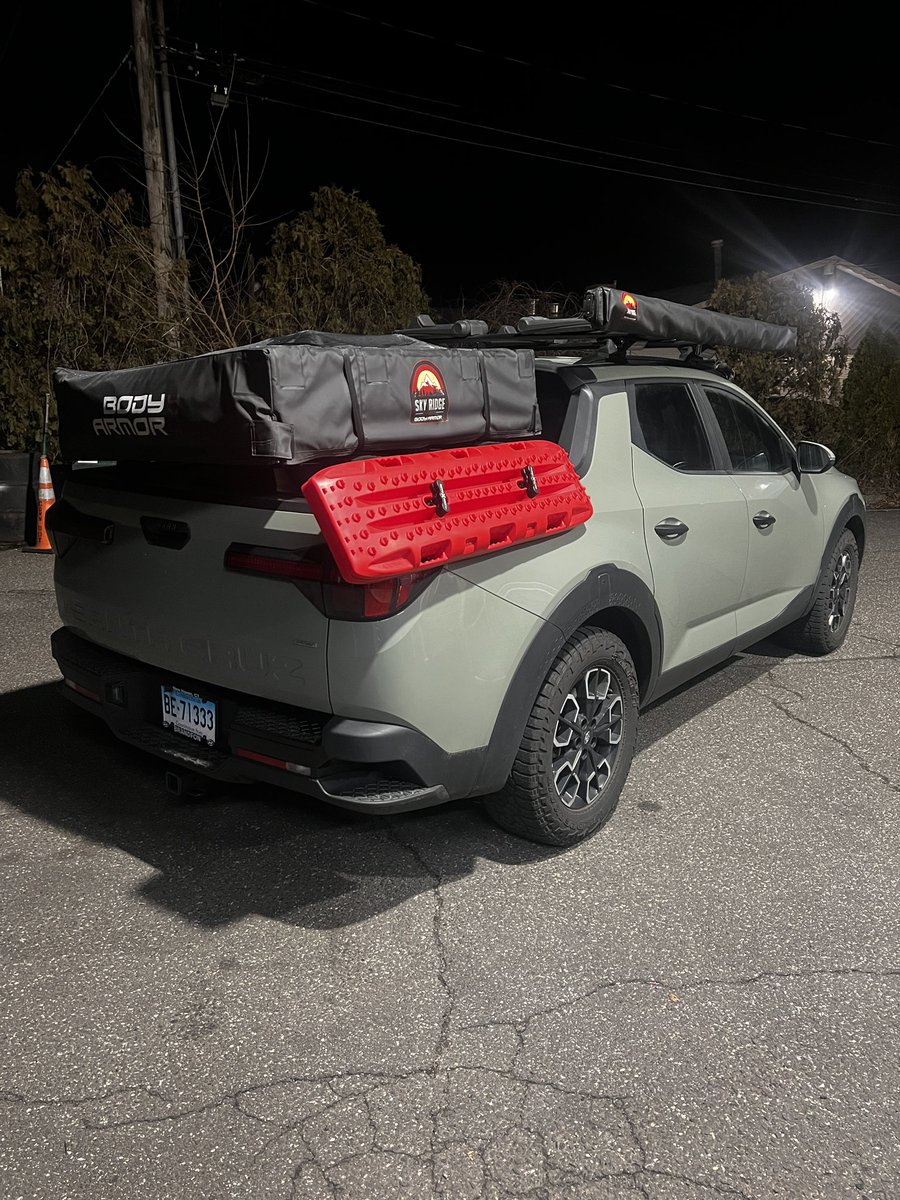 12v_Ike's tweet photo. Getting Adventure Ready!  Testing our new bed rail accessory brackets for the @Hyundai #SantaCruz with some @RotopaxOfficial  traction boards! https://t.co/Z6aFX9j5xH