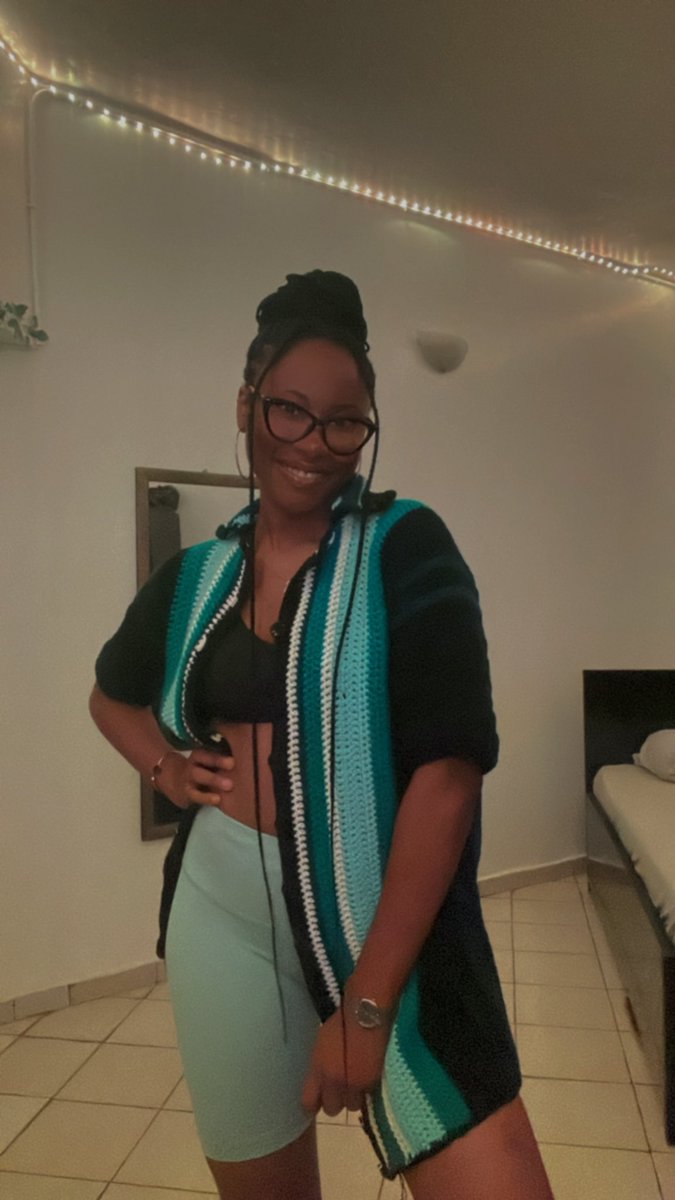 BObilor's tweet photo. The tweet is the crochet shirt. 
I wore it  two different ways, with biker shorts and grandma jeans (Couldn’t take a full picture without blurring out the details of the shirt…🙃) https://t.co/8NbPhH4aaK