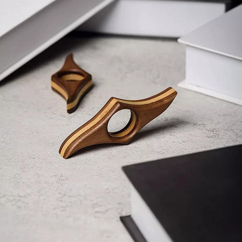 booklume's tweet image. Reading should be a relaxing and enjoyable experience, but constantly flipping pages can be a hassle. Our thumb page holders make it easy to keep track of your place and focus on the story. #thumbpageholder #bookaccessories #readingconvenience