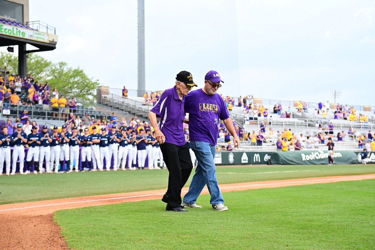 LSUbaseball's tweet photo. Thank you to WWII and Korean War Veteran, Floyd Nicholas Ourso Sr., for throwing out the first pitch!

#ThePowerhouse | #SoldierSalute https://t.co/Ry7sKajcql