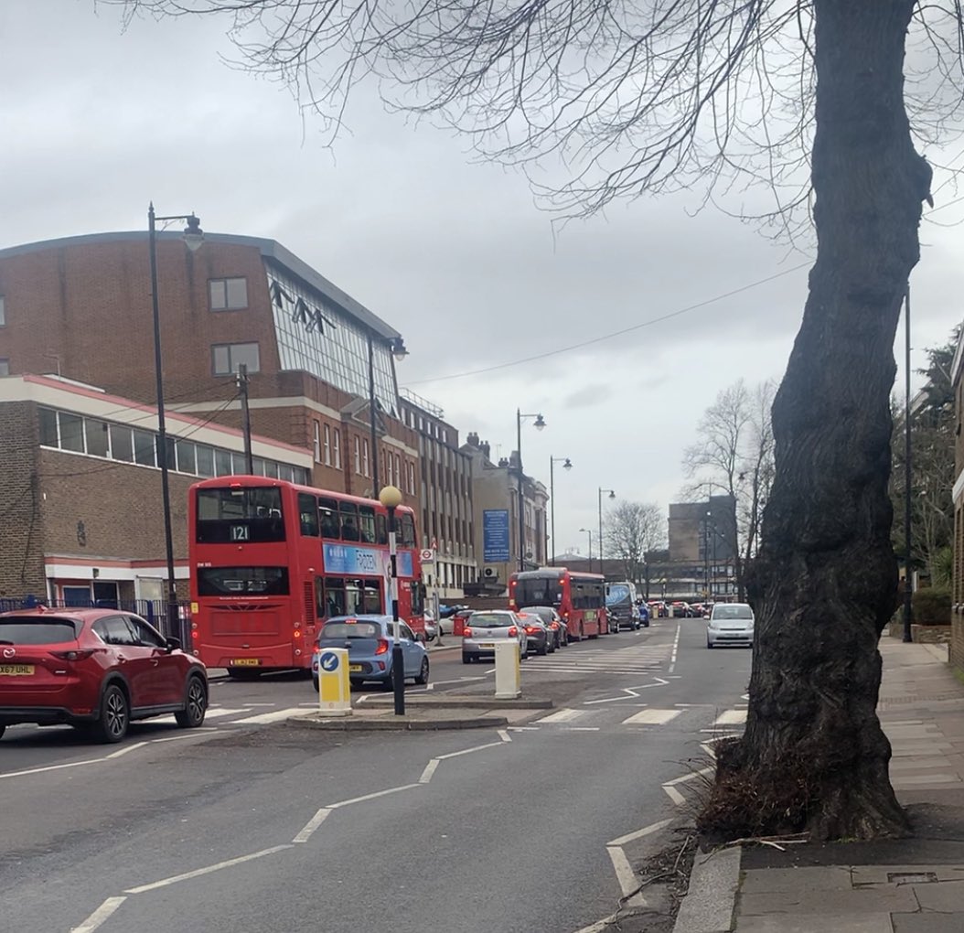 Sunday 3pm after enjoying Happy 90th Birthday celebration of @tfl iconic Southgate Station. Walking home in LTN displaced traffic on High St 👀 pedestrians &amp; children sucking up pollution. High car ownership Fox Lane LTN broke Southgate Circus.
