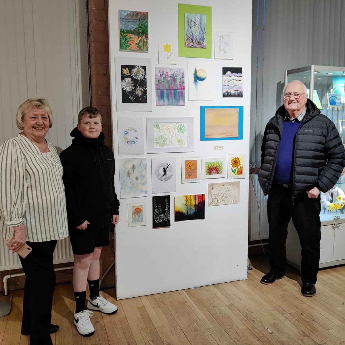 mojogo's tweet photo. @year6barwell Finlay L was very proud to see his nanna’s artwork on display at Atkins Building he took his too and it’s also on display with the Time Out Carers group.  @barwellacademy  3 framed pictures on the shelf. https://t.co/vlZiRfQe92