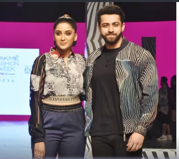 #NimritKaurAhluwalia stole all the limelight on #LakmeFashionWeek . She wore a creation made by Siddartha Tytler for the event and girl oh girl, she looks fabulous- Queen Vibes. 
#MahirPandhi too is looking like Prince Charming.