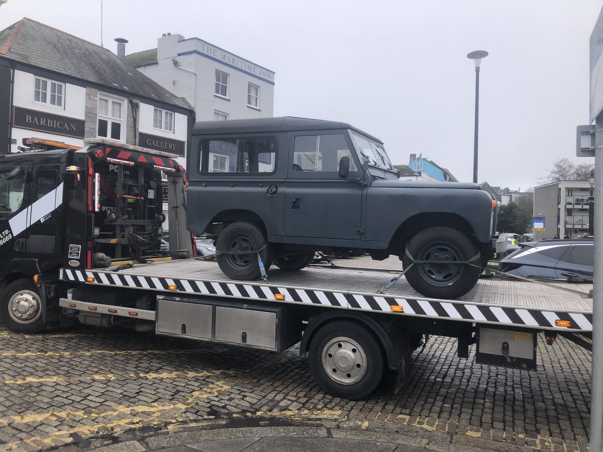 PCSO30747's tweet photo. Lovely vehicle, much admired by Sunday strollers this morning on @TheBarbican However, being badly parked with a parking ticket attached and a beer bottle in the front seat, it caught our attention. No MOT. No insurance. #checkyourpaperwork #seized @CharlesCrossLPP @DC_Police https://t.co/1biz4oSiIm