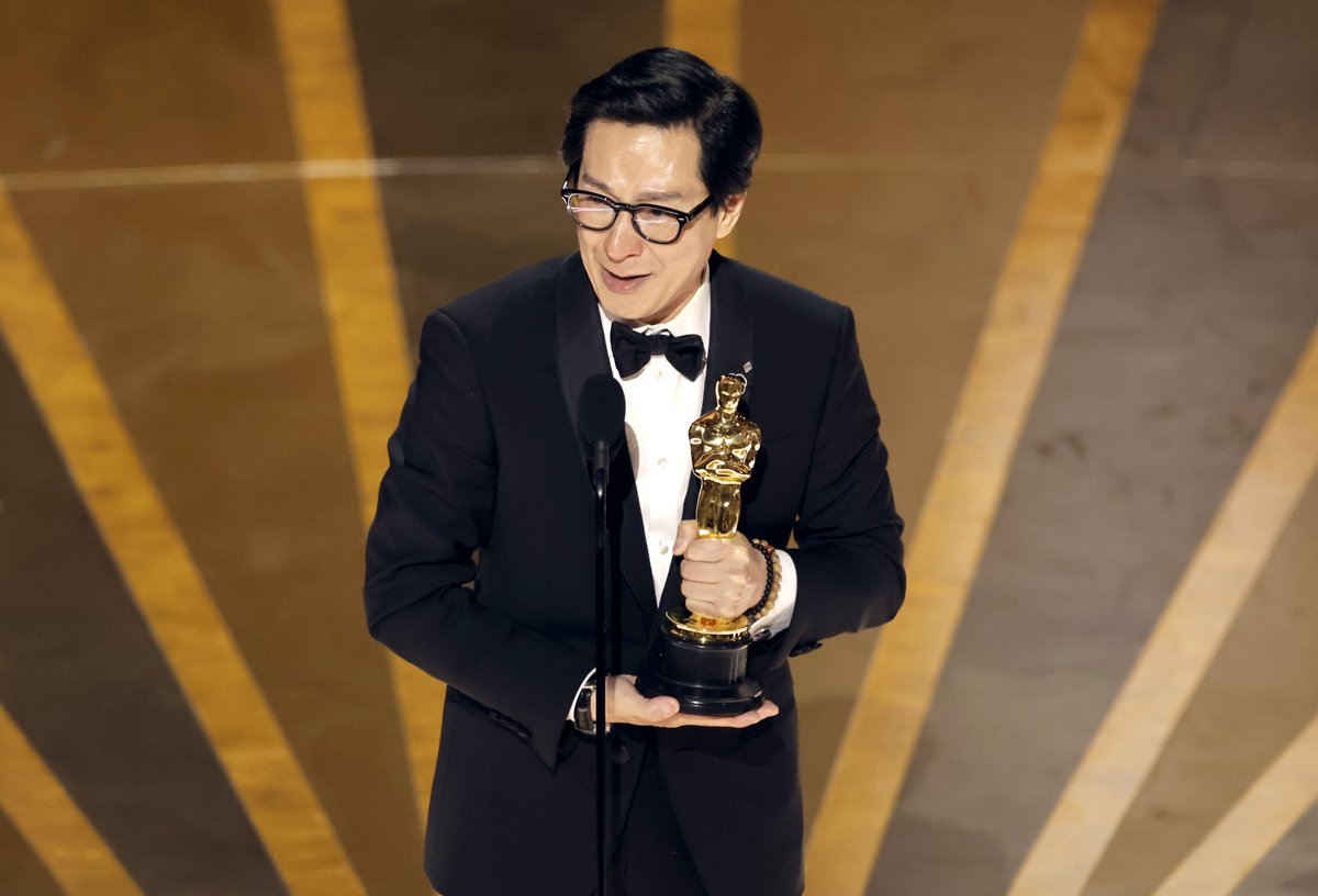 etnow's tweet photo. Ke Huy Quan accepts the Best Supporting Actor award for "Everything Everywhere All at Once." #Oscars95 https://t.co/TGAO9anOqP